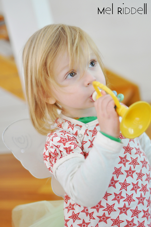 Sophia blowing trumpet